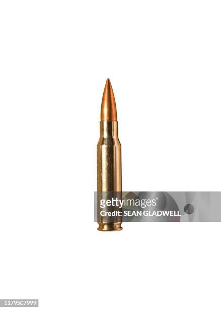 rifle bullet on white - cartridge stock pictures, royalty-free photos & images