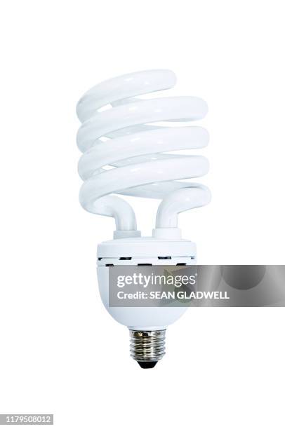 helix energy efficient light bulb - luz fluorescente imagens e fotografias de stock
