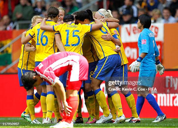 Sweden celebrates a goal by Lisa Dahlkvist against Korea DPR during the FIFA Women's World Cup 2011 Group C match between North Korea and Sweden at...