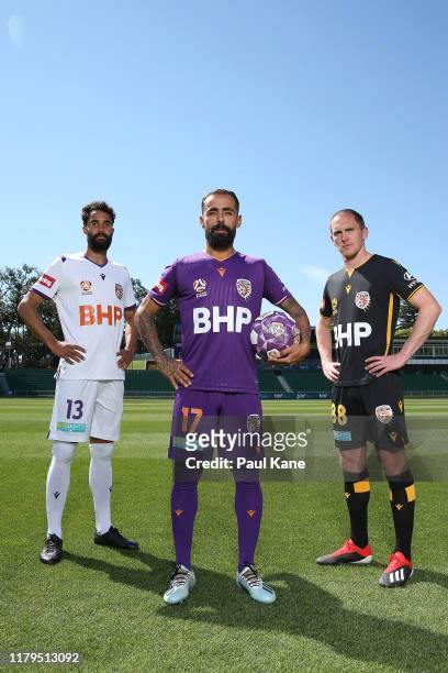 Osama Malik, Diego Castro and Neil Kilkenny of the Glory pose following a Perth Glory A-League press conference at HBF Park on October 07, 2019 in...