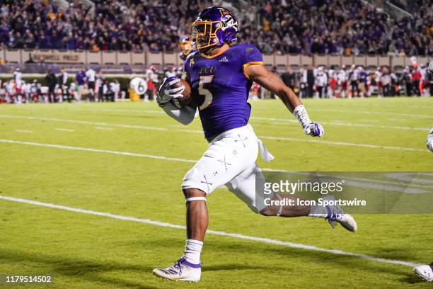 East Carolina Pirates wide receiver C.J. Johnson catches a touchdown pass during a game between the Cincinnati Bearcats and the East Carolina Pirates...