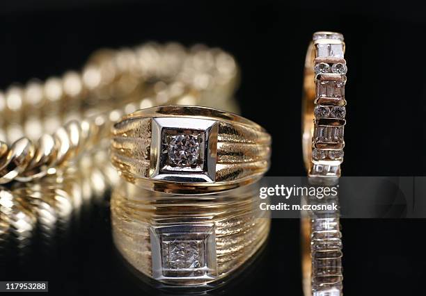 rings - gold chain necklace stock pictures, royalty-free photos & images