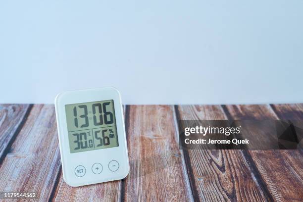 electronic lcd digital clock humidity temperature sensor display device - humidity stock pictures, royalty-free photos & images