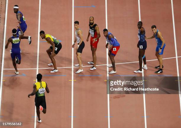 Wilbert London of the United States gets the baton from Michael Cherry in the Men's 4x400 metres relay final during day ten of 17th IAAF World...