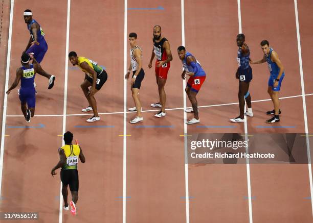 Wilbert London of the United States gets the baton from Michael Cherry in the Men's 4x400 metres relay final during day ten of 17th IAAF World...