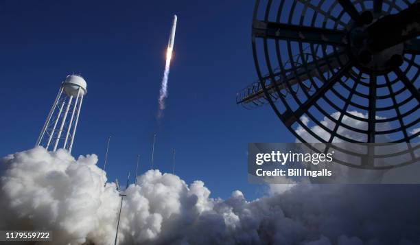 The Northrop Grumman Antares rocket, with Cygnus resupply spacecraft onboard, launches from Pad-0A of NASA's Wallops Flight Facility, Saturday,...