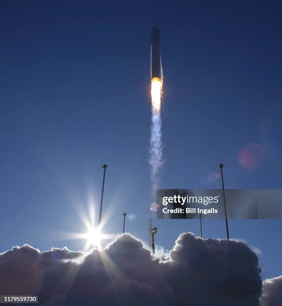 The Northrop Grumman Antares rocket, with Cygnus resupply spacecraft onboard, launches from Pad-0A of NASA's Wallops Flight Facility, Saturday,...