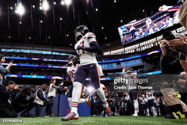 Sherrick McManis of the Chicago Bears runs out onto the pitch prior to during the NFL match between the Chicago Bears and Oakland Raiders at...