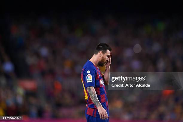 Lionel Messi of FC Barcelona looks on during the Liga match between FC Barcelona and Sevilla FC at Camp Nou on October 06, 2019 in Barcelona, Spain.