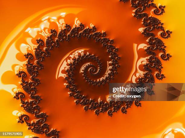 yellow brown swirly abstract fractal wave background art - fibonacci photos et images de collection