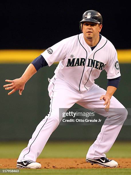 Jack Cust of the Seattle Mariners leads off of second base against the Atlanta Braves at Safeco Field on June 28, 2011 in Seattle, Washington.