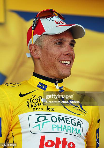 Philippe Gilbert of Belgium and Omega Pharma-Lotto wears the yellow jersey after winning stage one of the 2011 Tour de France from the Passage du...