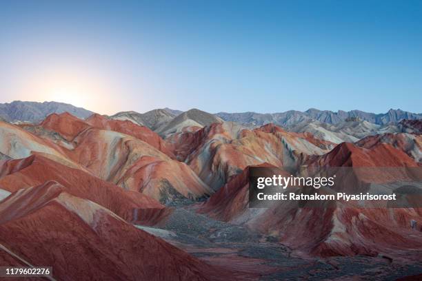 moonlight scene of amazing landscape at geological park rainbow mountain, danxia landform, gansu province, zhangye, china - zhangye photos et images de collection