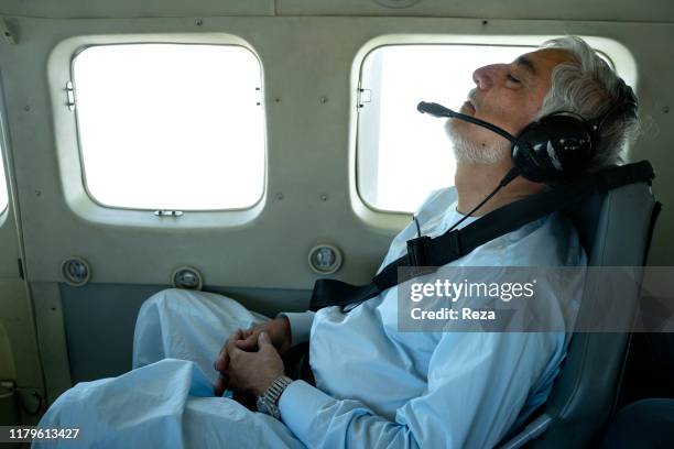 During his presidential campaign, Dr Abdullah rests in his military plane taking him back from Bamiyan. The fatigue is intense on a presidential...