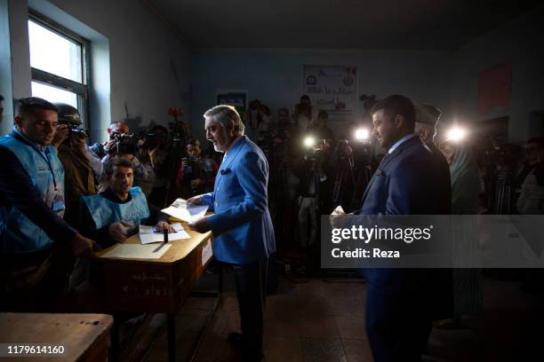 On the voting day, the candidate Dr Abdullah conducts his civil duty by voting under the watch of those present. Dr Abdullah Abdullah is an Afghan...