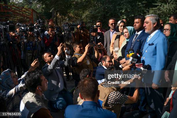 On the voting day, the candidate Dr Abdullah speaks after voting under the watched of those present. He answers to journalists' questions.Dr Abdullah...