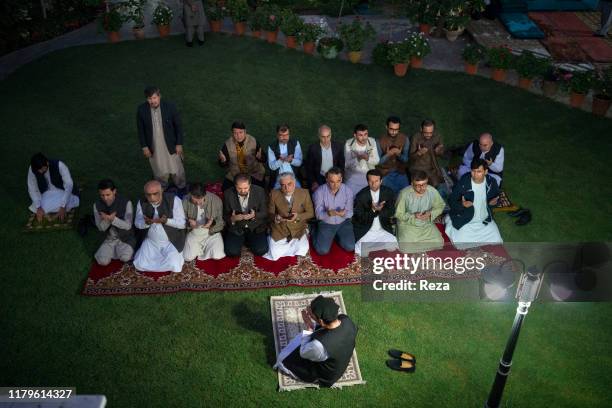 On the voting day, the candidate Dr Abdullah prays.Dr Abdullah Abdullah is an Afghan political leader, Chief Executive Officer of the country since...