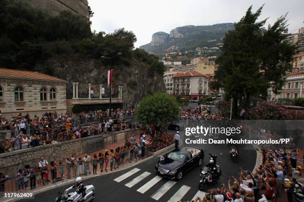 The car drives through the street after the religious ceremony of the Royal Wedding of Prince Albert II of Monaco to Charlene Wittstock on July 2,...