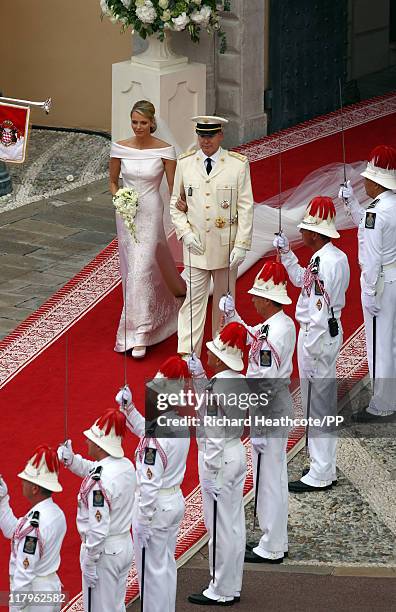 Prince Albert II of Monaco and Princess Charlene of Monaco leave the palace after the religious ceremony of the Royal Wedding at the Prince's Palace...