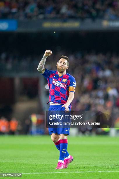 October 6: Lionel Messi of Barcelona celebrates after scoring his sides fourth goal from a free kick during the Barcelona V Sevilla, La Liga regular...