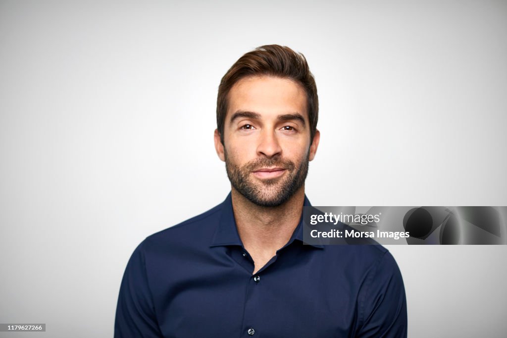 Handsome mid adult businessman with stubble