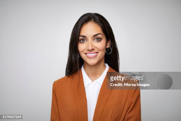 smiling beautiful female ceo with hazel eyes - west asia stock pictures, royalty-free photos & images