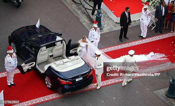 Prince Albert II of Monaco and Princess Charlene of Monaco leave the palace after the religious ceremony of the Royal Wedding at the Prince's Palace...