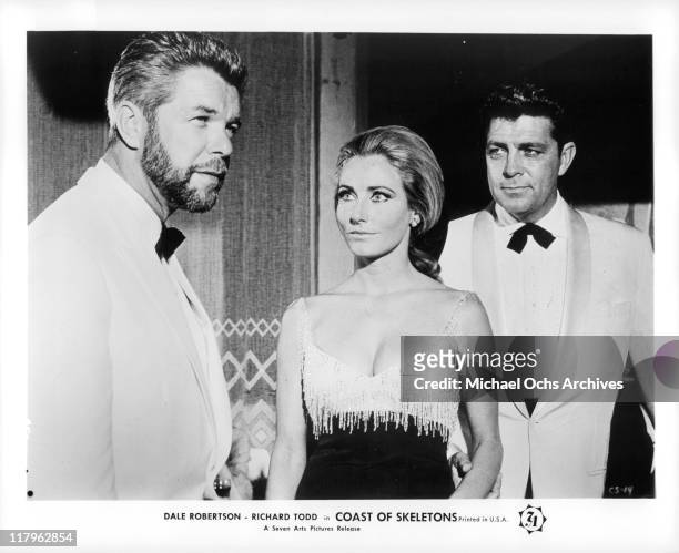 Heinz Drache with Elga Andersen and Dale Robertson in a scene from the film 'Coast of Skeletons', 1964.