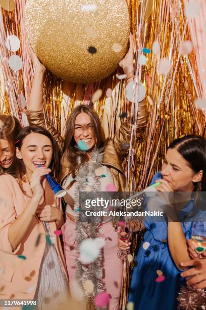 girlfriends celebrating new year's eve - new years eve 2019 stock pictures, royalty-free photos & images