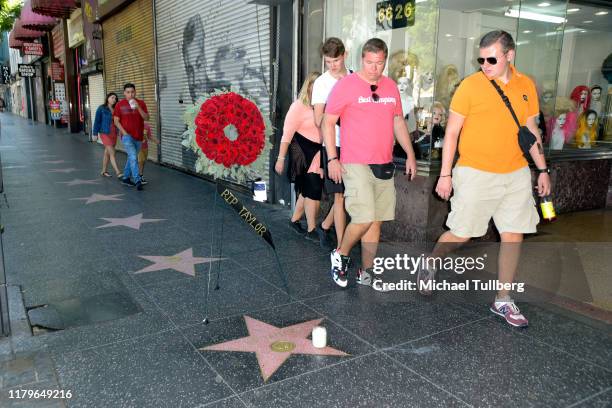 Flowers are placed on the Hollywood Walk of Fame Star in remembrance of comedian and actor Rip Taylor on October 7, 2019 in Hollywood, California....