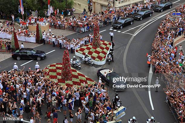 Prince Albert II of Monaco and Princess Charlene of Monaco depart from Sainte Devote church after their religious wedding ceremony at the Prince's...