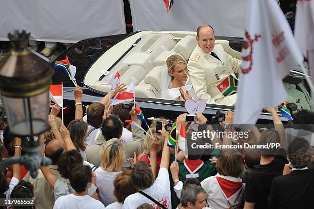 Prince Albert II of Monaco and Princess Charlene of Monaco make their journey to Sainte Devote church after their religious wedding ceremony at the...