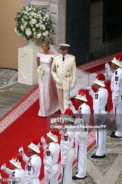 Prince Albert II of Monaco and Princess Charlene of Monaco leave the palace after the religious ceremony of the Royal Wedding at the Prince's Palace...