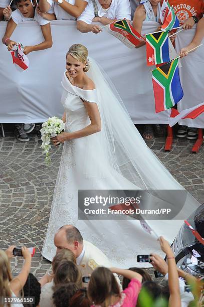 Prince Albert II of Monaco and Princess Charlene of Monaco make their journey to Sainte Devote church after their religious wedding ceremony at the...