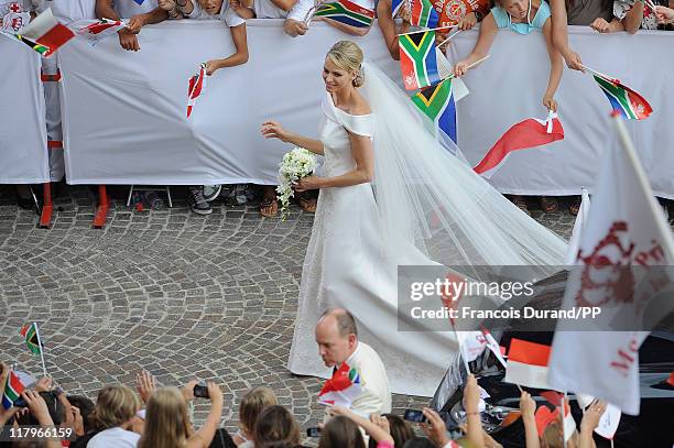 Prince Albert II of Monaco and Princess Charlene of Monaco make their journey to Sainte Devote church after their religious wedding ceremony at the...