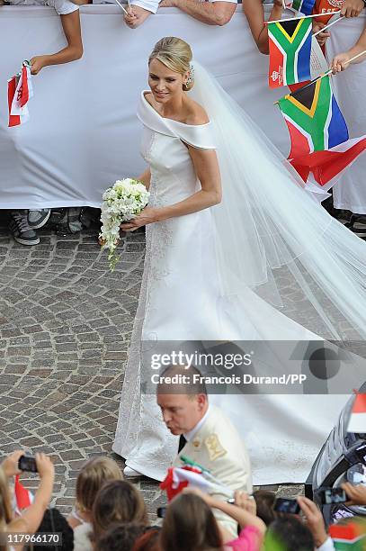 Prince Albert II of Monaco and Princess Charlene of Monaco make their journey to Sainte Devote church after their religious wedding ceremony at the...