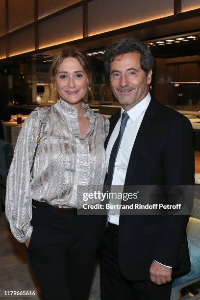 Daniela Lumbroso and his husband Eric Ghebali attend the Inauguration evening of "PavYllon - a restaurant by Yannick Alleno" at Pavillon Ledoyen on...
