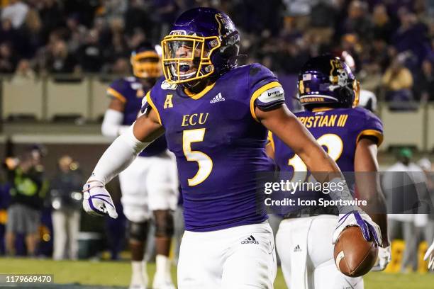 East Carolina Pirates wide receiver C.J. Johnson celebrates after making a catch during a game between the Cincinnati Bearcats and the East Carolina...