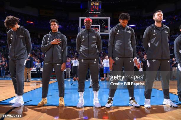 The New Orleans Pelicans during the National Anthem before the game against the Oklahoma City Thunder on November 2, 2019 at Chesapeake Energy Arena...