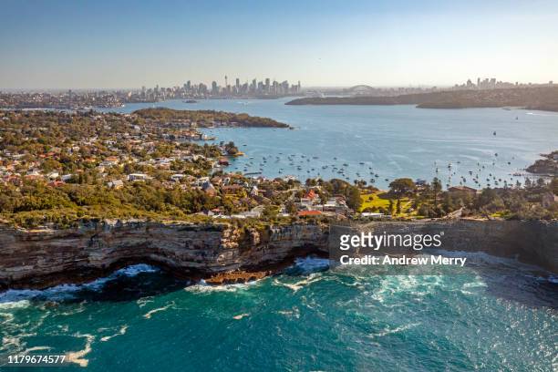 aerial view of sydney with sea cliffs, the gap, watsons bay, suburbs, sydney harbour and city skyline, australia - hochhaus centrepoint tower stock-fotos und bilder