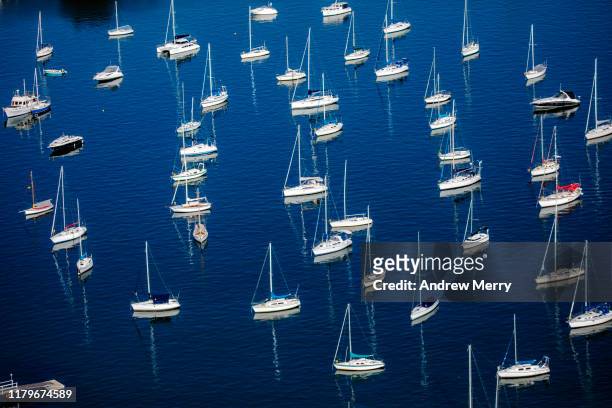 sailing boats moored in sydney harbour, australia, aerial photography - moored stock pictures, royalty-free photos & images