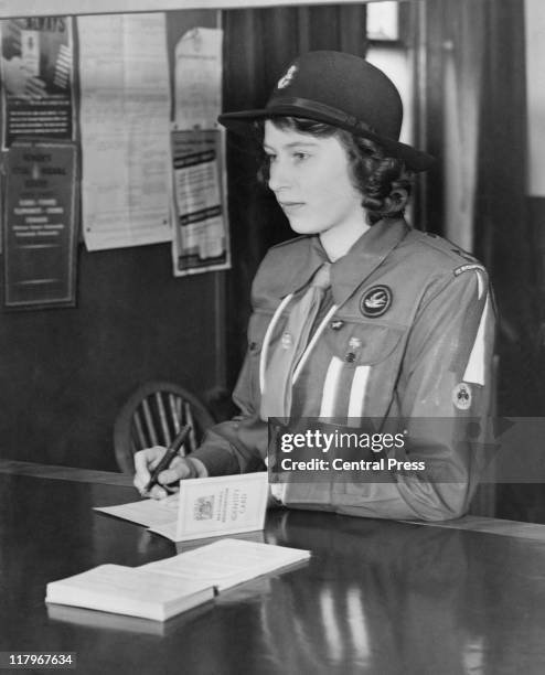 Year-old Princess Elizabeth registers for war service under the Ministry of Labour's Youth Registration Scheme, 25th April 1942. She is wearing her...