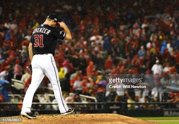 Max Scherzer of the Washington Nationals walks on the field to start the fifth inning of game four of the National League Division Series against the...