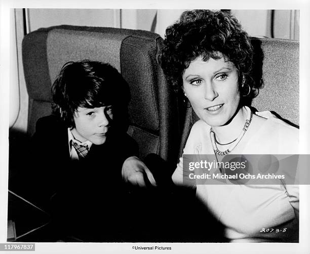 Susan Clarke sitting with Brian Morrison in a scene from the film 'Airport', 1970.