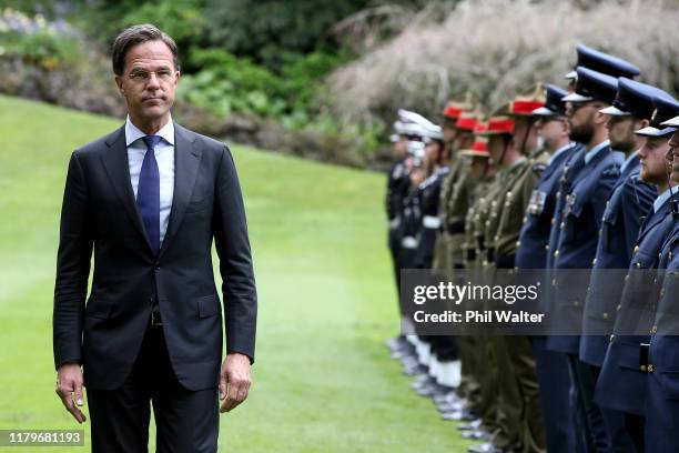 Netherlands Prime Minister Mark Rutte inspects a guard of honour following a powhiri at Government House on October 08, 2019 in Auckland, New...