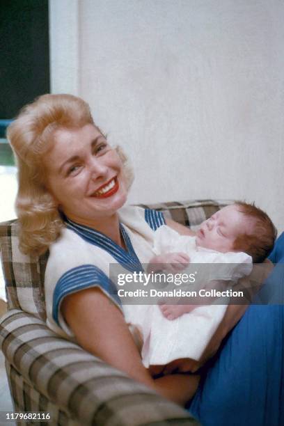 Janet Leigh at home with daughter Kelly Curtis on August 04, 1956 in Los Angeles, California.