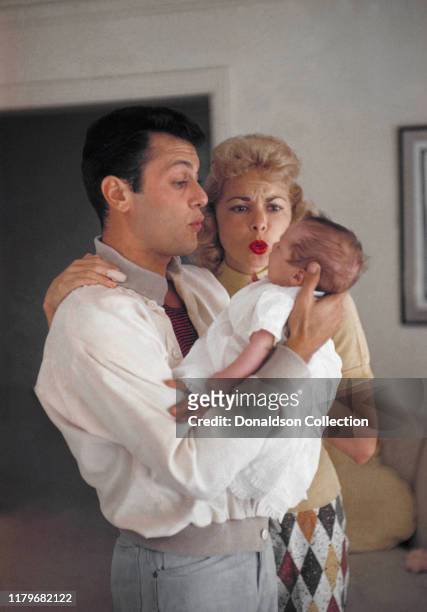 Janet Leigh at home with daughter Kelly Curtis and husband Tony Curtis on August 04, 1956 in Los Angeles, California.