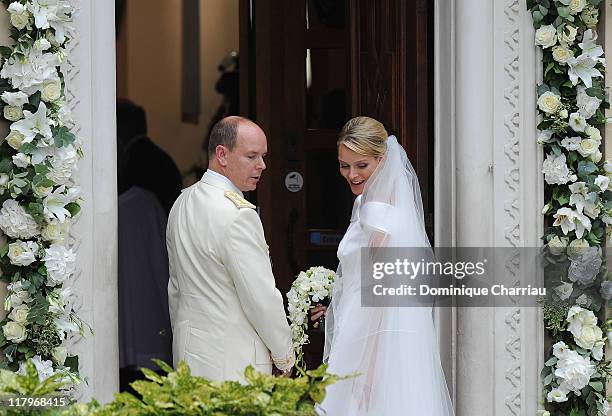 Prince Albert II of Monaco and Princess Charlene of Monaco arrive at Sainte Devote church after the religious ceremony of their Royal Wedding at the...