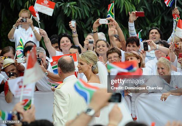 Prince Albert II of Monaco and Princess Charlene of Monaco arrive at Sainte Devote church after the religious ceremony of their Royal Wedding at the...