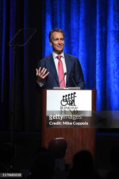 Cris Collinsworth speaks onstage during the 34th Annual Great Sports Legends Dinner To Benefit The Buoniconti Fund To Cure Paralysis at The Hilton...